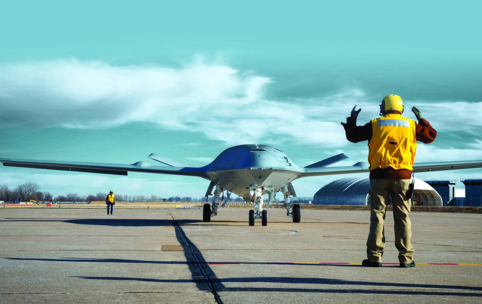 MQ-25 Missions, Deck Handling Demonstration Rehearsals, Day 3, St. Louis, MO_1/26/2018_RMS#311397_MSF17-0064 Series.  The MQ-25 is an unmanned combat aircraft system designed to provide refueling capability to extend the combat range of carrier air-wing assets such as the F/A-18 Super Hornet and F-35C Joint Strike Fighter.