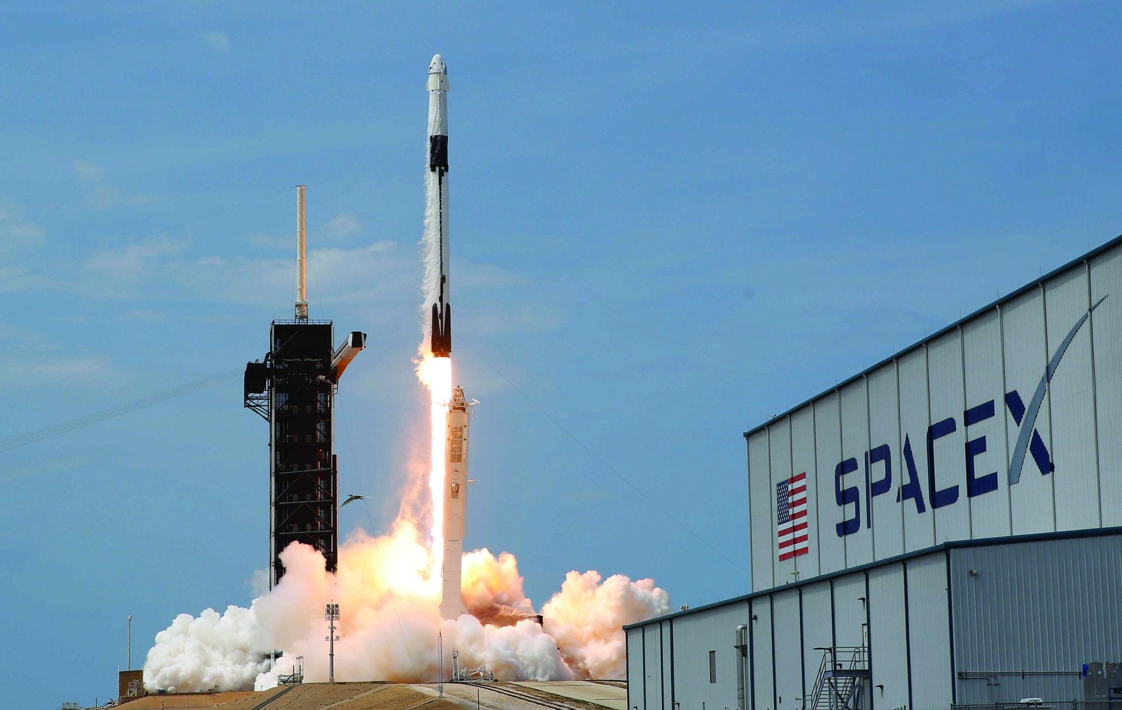 FILE PHOTO: A SpaceX Falcon 9 rocket and Crew Dragon spacecraft carrying NASA astronauts Douglas Hurley and Robert Behnken lifts off during NASA's SpaceX Demo-2 mission to the International Space Station from NASA's Kennedy Space Center in Cape Canaveral, Florida, U.S., May 30, 2020. REUTERS/Joe Skipper/File Photo