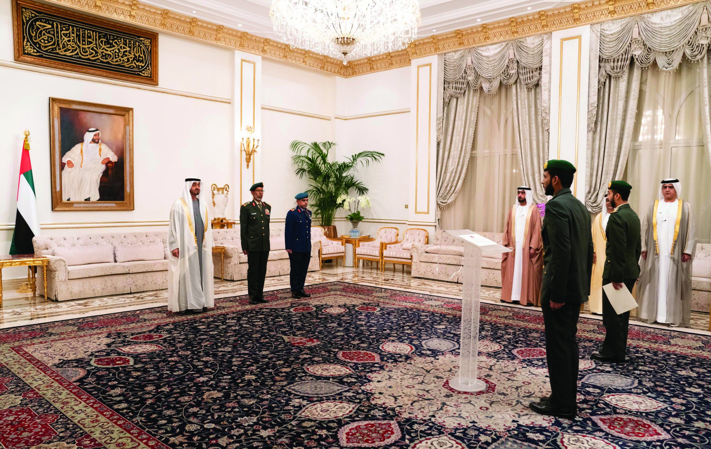 ABU DHABI, UNITED ARAB EMIRATES - February 17, 2020: HH General Sheikh Mohamed bin Zayed Al Nahyan Crown Prince of Abu Dhabi Deputy Supreme Commander of the UAE Armed Forces (L), witnesses the oath of a UAE military judiciary official during a swearing in ceremony for new military judges and prosecutors, during a Sea Palace barza. Seen with HE Lt General Hamad Thani Al Romaithi, Chief of Staff UAE Armed Forces (2nd L) and HE Brigadier General Salim Juma Al Kaabi, Director of Military Justice (3rd L). 

( Hamad Al Kaabi / Ministry of Presidential Affairs )
---