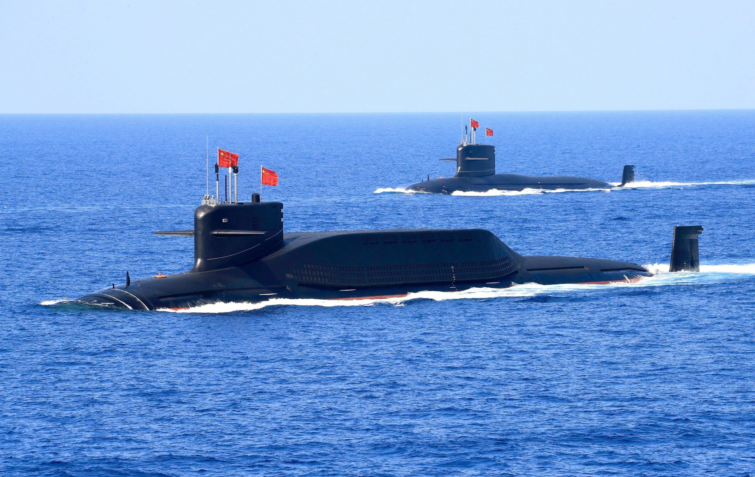 FILE PHOTO: A nuclear-powered Type 094A Jin-class ballistic missile submarine of the Chinese People's Liberation Army (PLA) Navy is seen during a military display in the South China Sea April 12, 2018. Picture taken April 12, 2018.  REUTERS/Stringer ATTENTION EDITORS - THIS IMAGE WAS PROVIDED BY A THIRD PARTY. CHINA OUT./File Photo