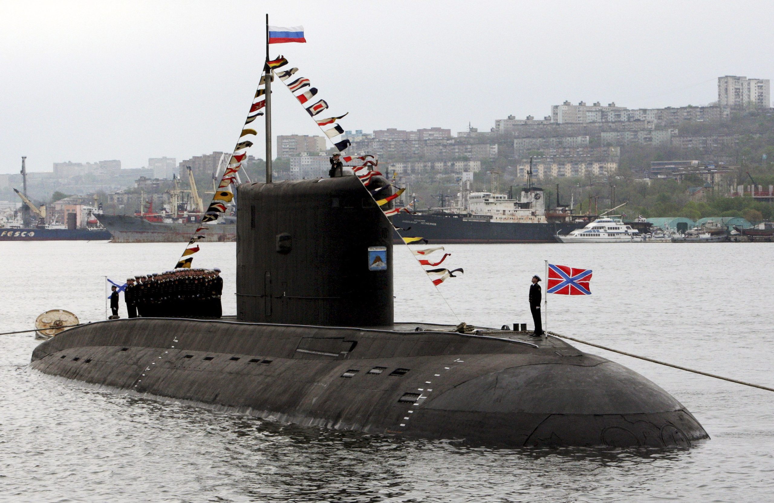 The crew of the Varshavyanka class diesel submarine take part at the Victory Day parade in Vladivostok, Russia, May 9, 2015. Russia marks the 70th anniversary of the end of World War Two in Europe on Saturday with a military parade, showcasing new military hardware at a time when relations with the West have hit lows not seen since the Cold War. REUTERS/Host Photo Agency/RIA Novosti ATTENTION EDITORS - THIS IMAGE HAS BEEN SUPPLIED BY A THIRD PARTY. IT IS DISTRIBUTED, EXACTLY AS RECEIVED BY REUTERS, AS A SERVICE TO CLIENTS - LR2EB590HOPGL
