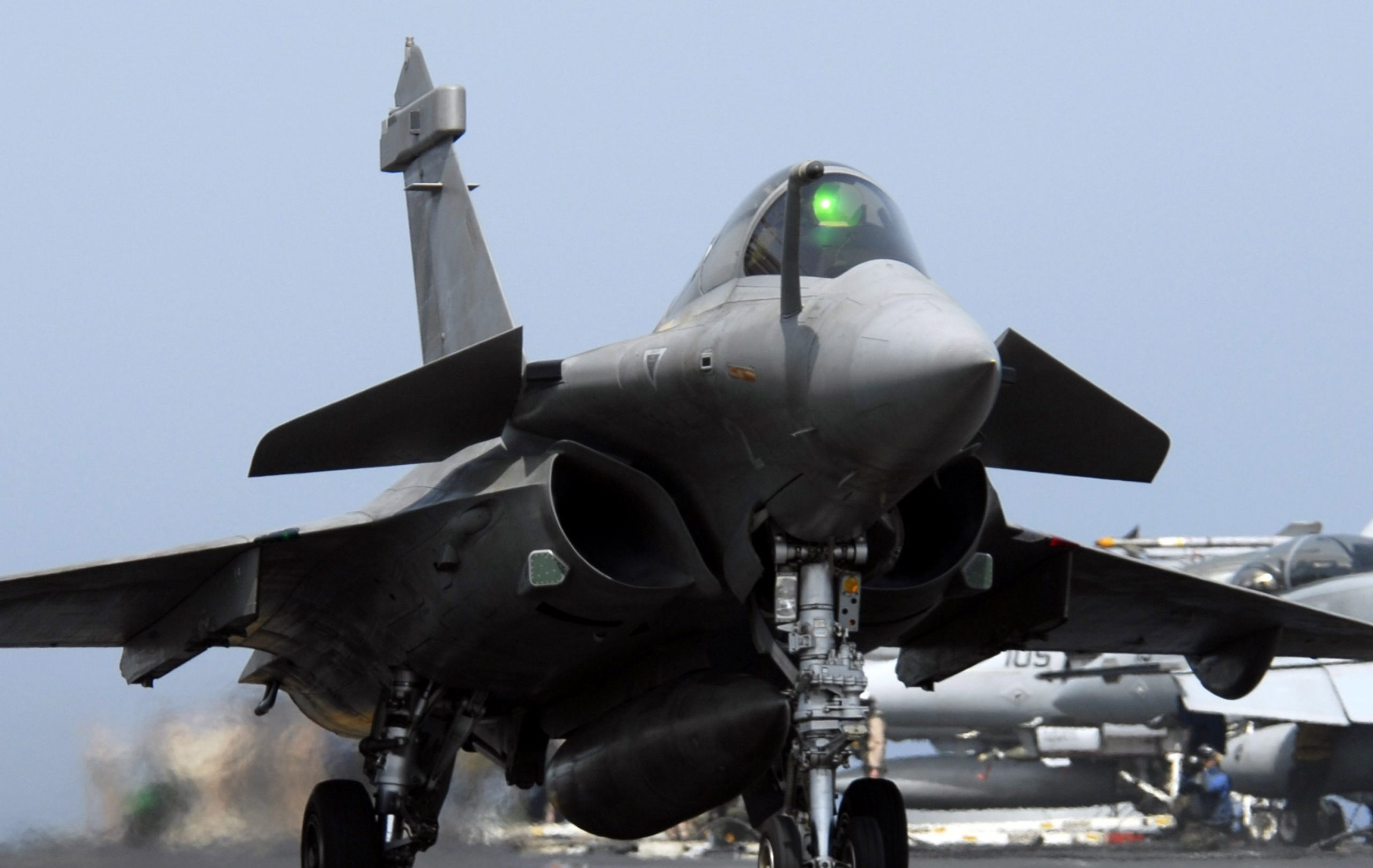 A French Dassault Rafale aircraft from the nuclear-powered aircraft carrier French Navy Ship Charles de Gaulle (R 91) performs a touch-and-go landing April 12, 2007, on the flight deck of the Nimitz-class aircraft carrier USS John C. Stennis (CVN 74). St ennis, as part of the John C. Stennis Carrier Strike Group, and Charles de Gaulle, the flagship of Commander, Task Force 473, are operating in the Northern Arabian Sea. (U.S. Navy photo by Mass Communication Specialist 1st Class Denny Cantrell) (Released )