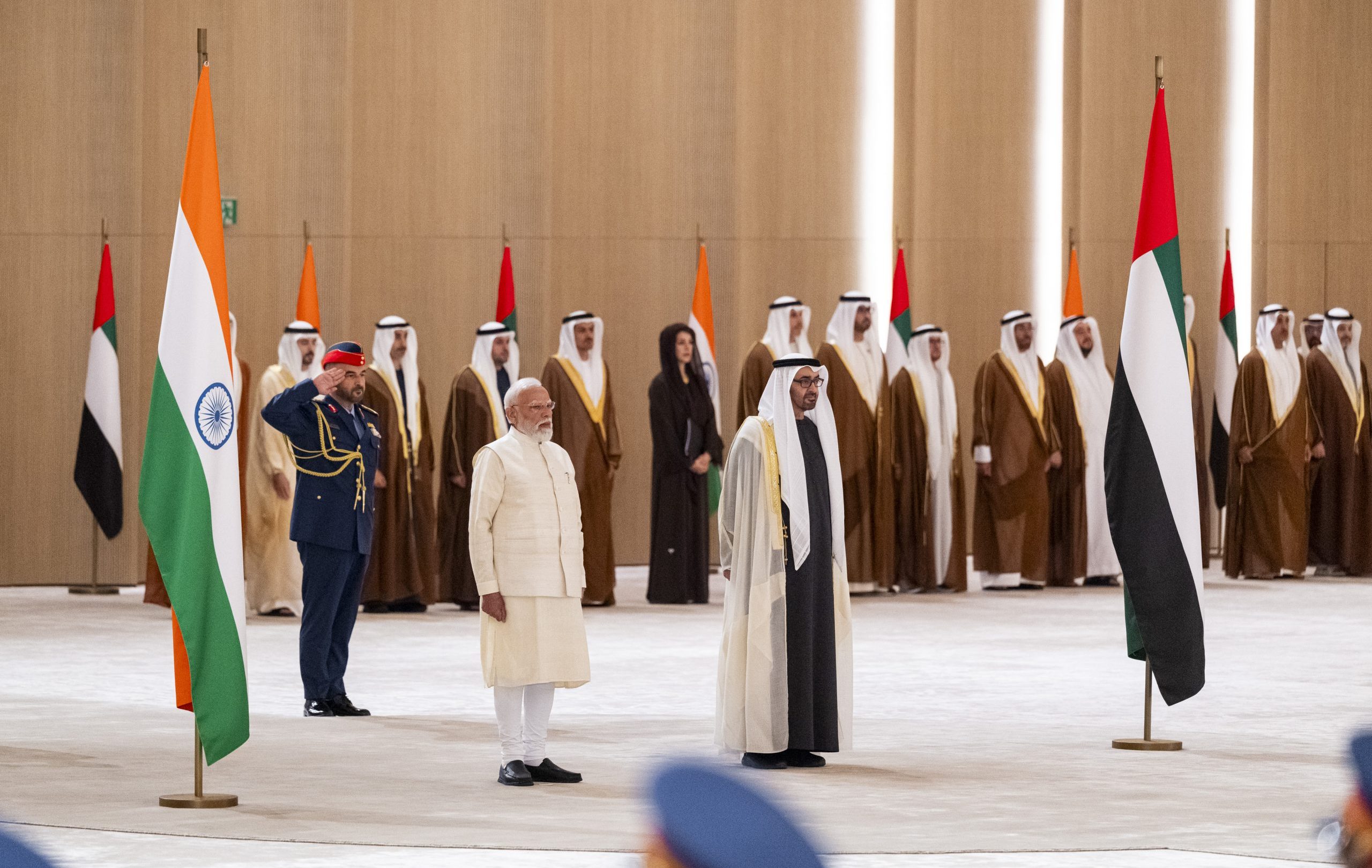 ABU DHABI, UNITED ARAB EMIRATES - May 15, 2026: HH Sheikh Mohamed bin Zayed Al Nahyan, President of the United Arab Emirates (center R) and HE Narendra Modi, Prime Minister of India (center L), stand for the national anthem during an official visit, at the Presidential Airport. 

( Abdulla Al Bedwawi / UAE Presidential Court )
---