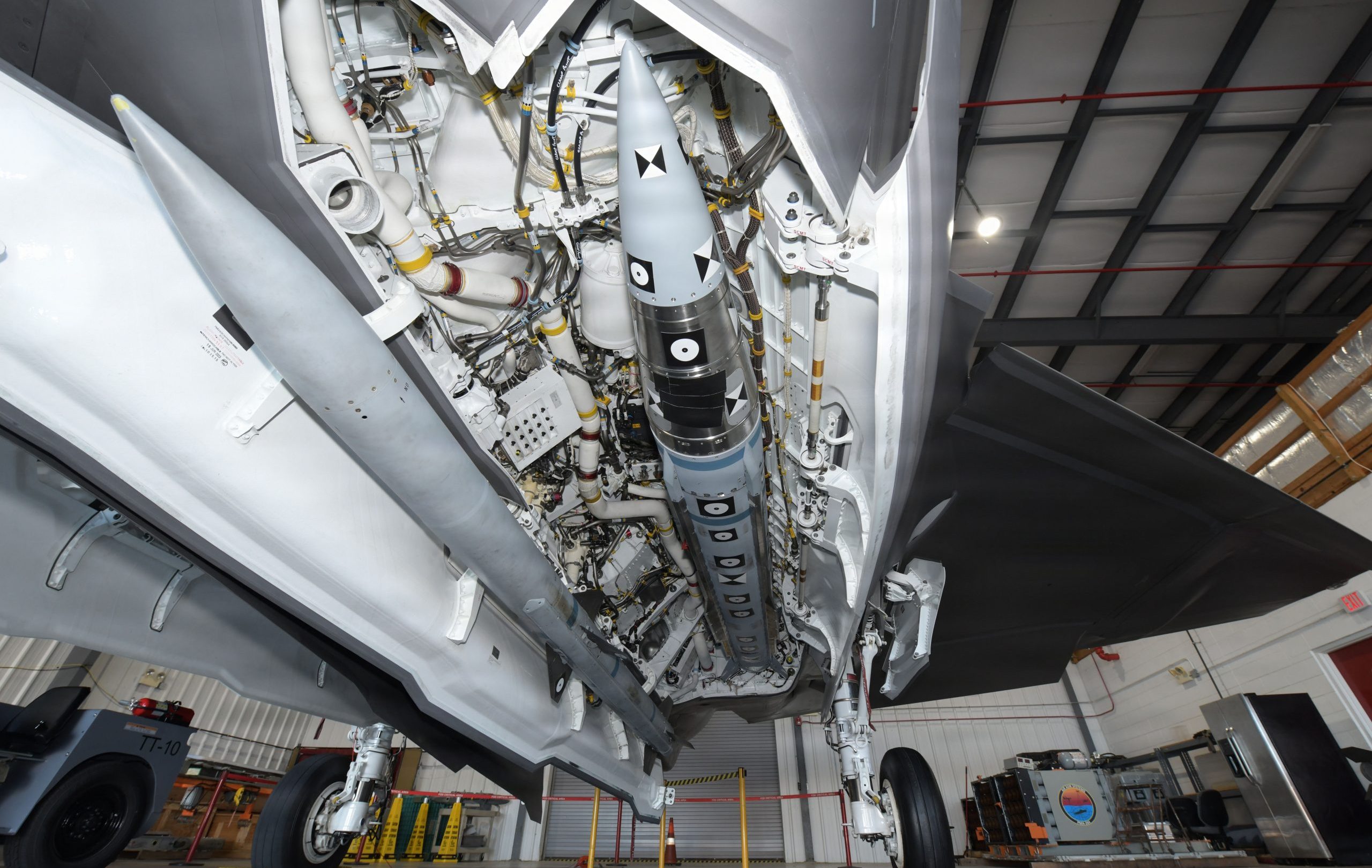 U.S. Navy File Photo - An AIM-424 Long Range Air-to-Air Missile (LRAAM) is mounted in the internal weapons bay of an F-35C with an AIM-120 Advanced Medium Range Air-to-Air Missile (AMRAAM) mounted on the weapon bay door. The AIM-424 LRAAM is the Department of the Navy's next-generation, long-range air-to-air missile, built to give Marine and Naval aviators the capability they need to defeat advanced threats and defend the force.